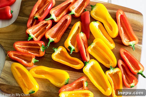 Golden Pepper Poppers 4 Preparation step: Mini bell pepper halves filled with cream cheese mixture
