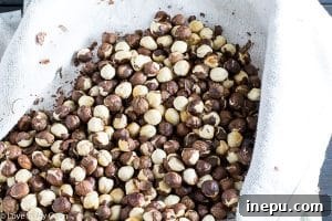 Smooth, creamy homemade hazelnut butter in a food processor, before chocolate is added.