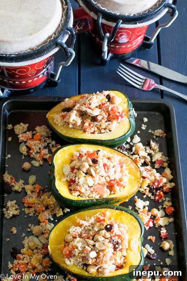 Close-up of a Moroccan Couscous Stuffed Acorn Squash, showcasing the colorful filling