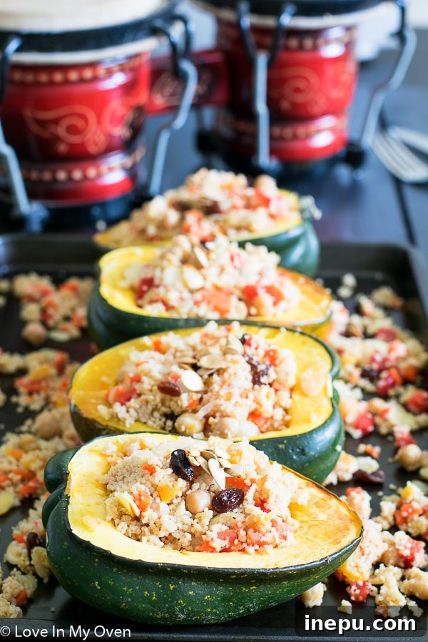 A beautifully plated Moroccan Couscous Stuffed Acorn Squash, ready to be served