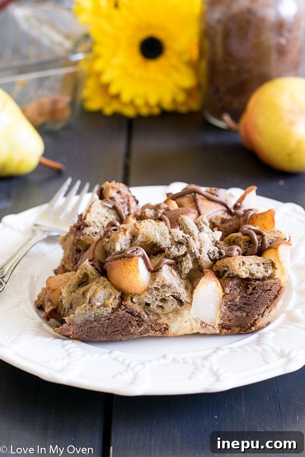 Nutella Pear French Toast Bake with powdered sugar