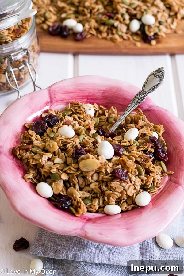 Sweet Cherry Toasted Almond Granola 2 Light and crunchy homemade cherry almond granola with dried cherries, yogurt covered raisins, and slivered almonds