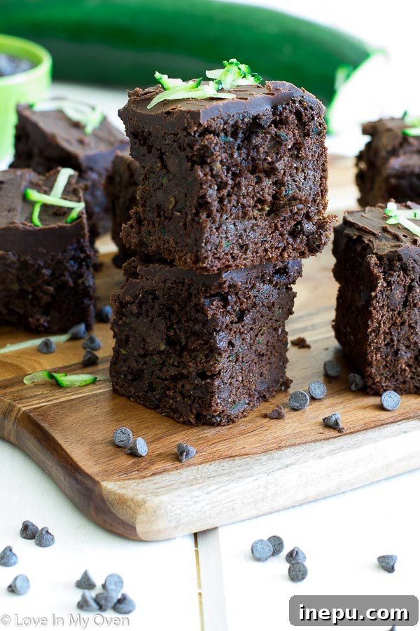 Guilt-Free Double Chocolate Zucchini Brownies 2 Moist and healthy double chocolate zucchini brownies on a cooling rack