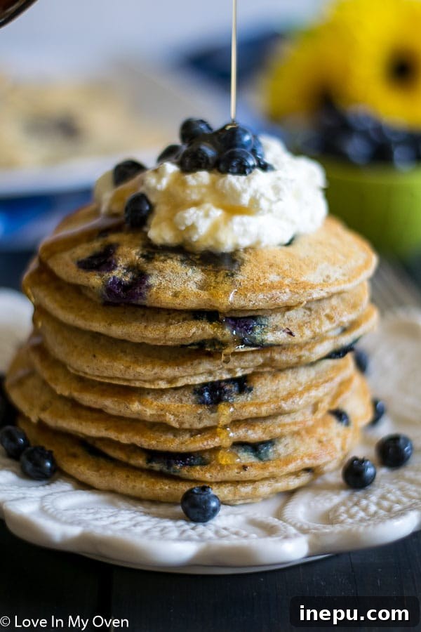 Close-up of fluffy Whole Wheat Blueberry Buttermilk Pancakes