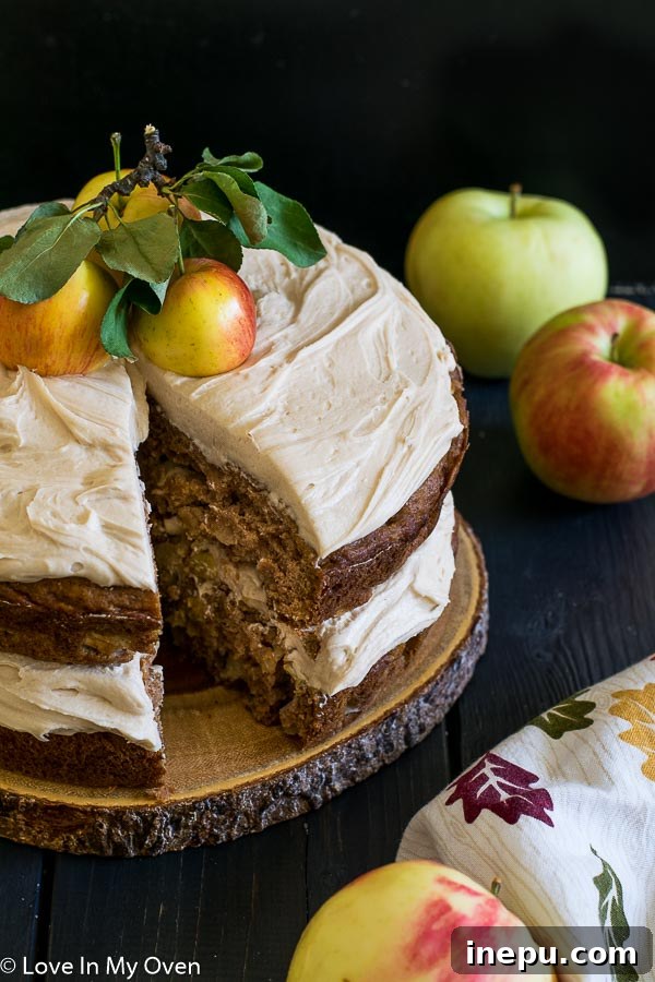 Decadent Salted Caramel Apple Cake 6 Salted Caramel Apple Cake on a wooden board