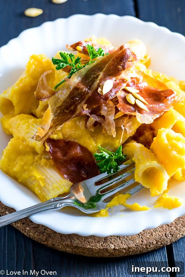 Butternut Squash Pasta with Crispy Prosciutto on a Fork