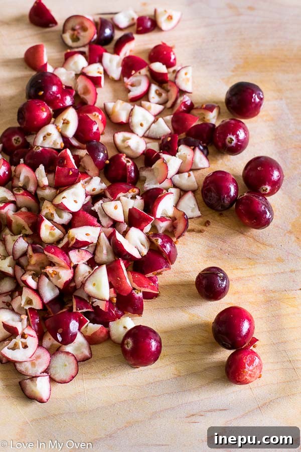 Baked cranberry donuts cooling on a rack