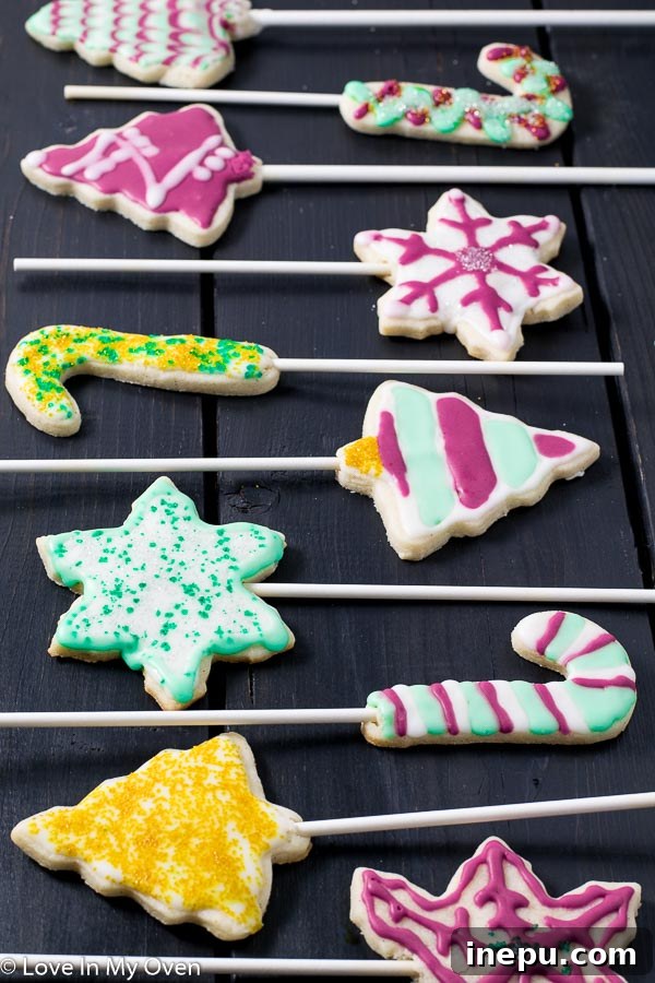 Holiday Cookie Pops 2 Delicious Vanilla Bean Christmas Cookie Pops on a stick, perfect for holiday gatherings.