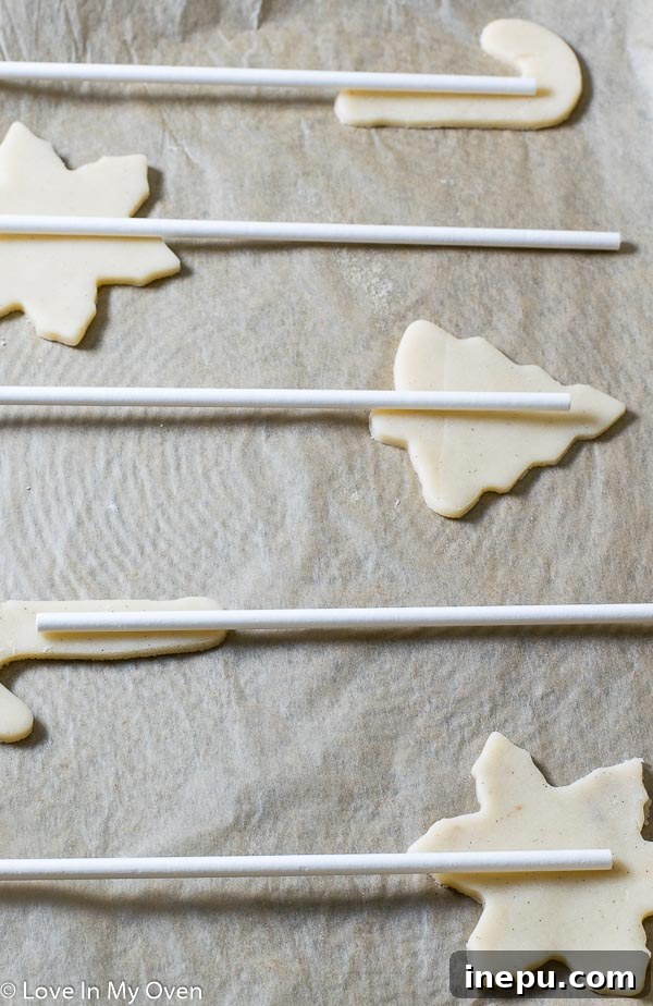 Holiday Cookie Pops 3 A tray of vanilla bean cookie pops freshly out of the oven, ready for stick insertion.