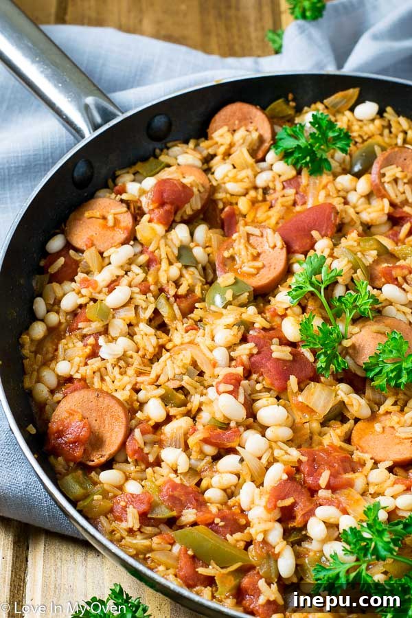 Zesty Sausage and White Bean Skillet with fresh herbs