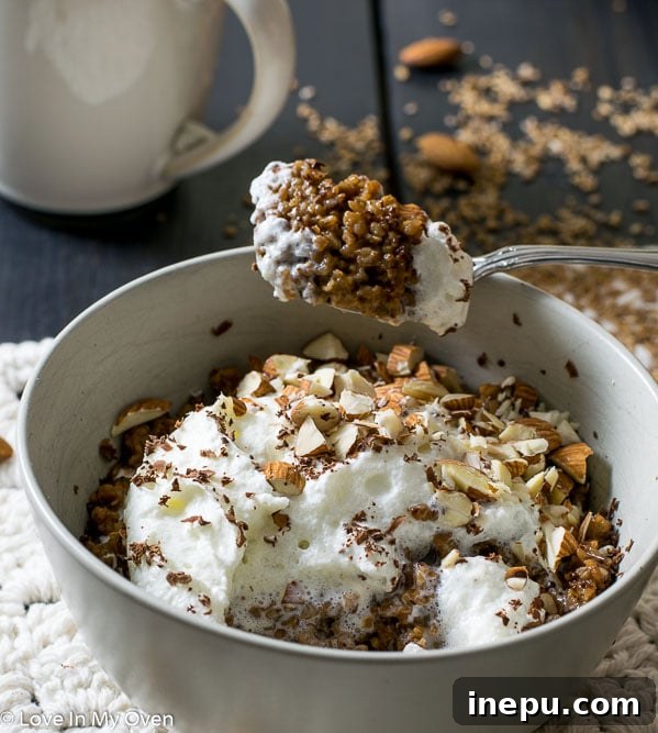 Almond Java Morning Bulgur 4 Close-up of Almond Java Breakfast Bulgur bowl with whipped cream and almonds