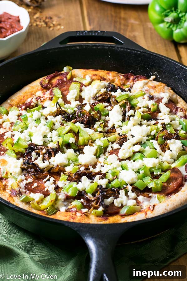 Sweet & Savory Chorizo Onion Pizza 2 Chorizo and Caramelized Onion Skillet Pizza - a homemade deep dish pizza cooked in a cast iron pan, featuring rich, sweet caramelized onions and spicy chorizo sausage on a whole wheat crust.