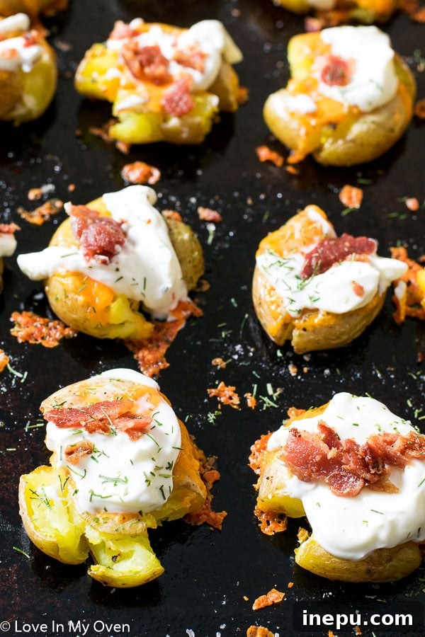 Loaded Smashed Potatoes with bacon and cheese