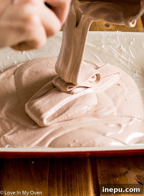 Artisan Chocolate Strawberry Marshmallows 4 Marshmallow mixture setting in a pan