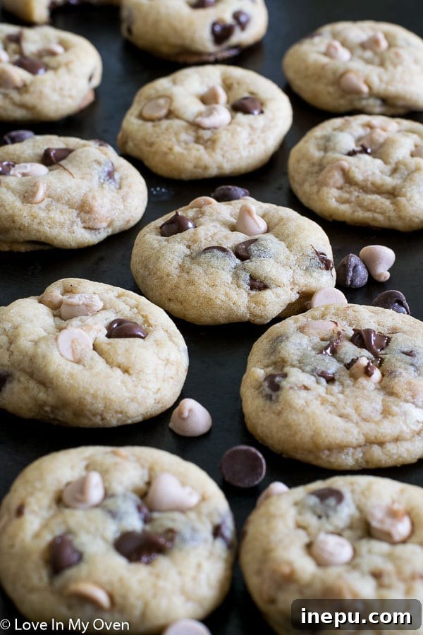 Stack of freshly baked sea salt caramel chocolate chip cookies