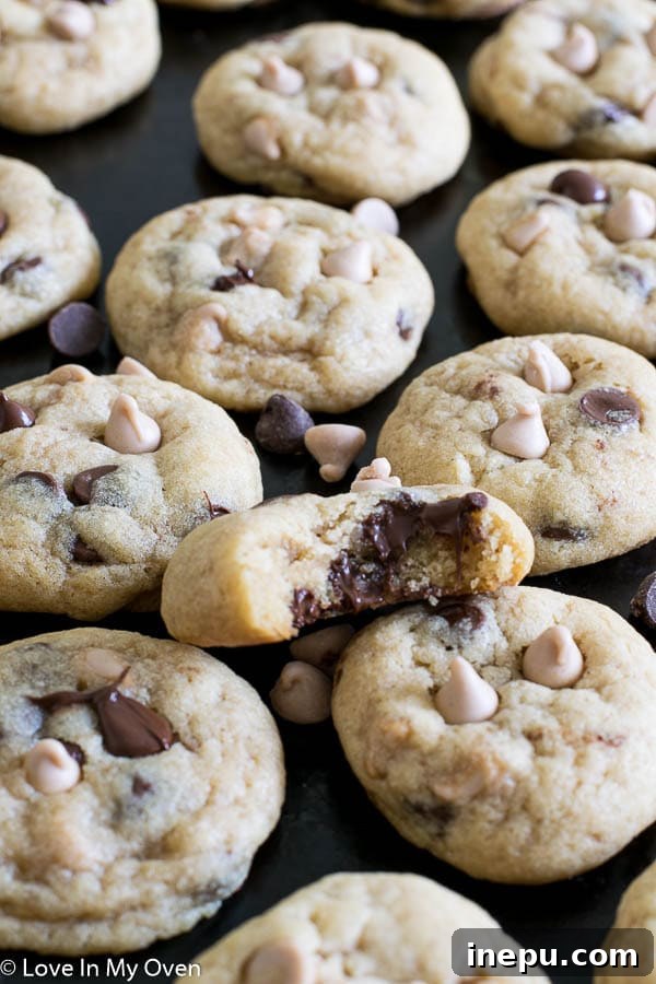 Close-up of a single sea salt caramel chocolate chip cookie, showcasing its texture