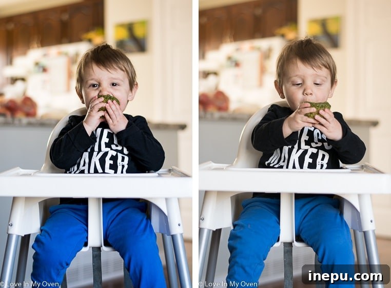 Emerald Monster Muffins 6 A child's hand reaching for a green monster muffin, highlighting their kid-friendly appeal.