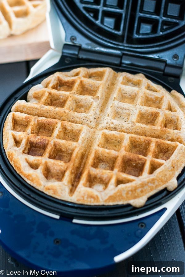 Nourishing Banana Waffles 5 Stack of healthy banana waffles with a hint of pink