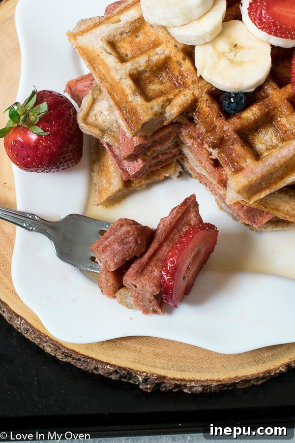 Nourishing Banana Waffles 7 Healthy banana waffles with a side of fresh fruit