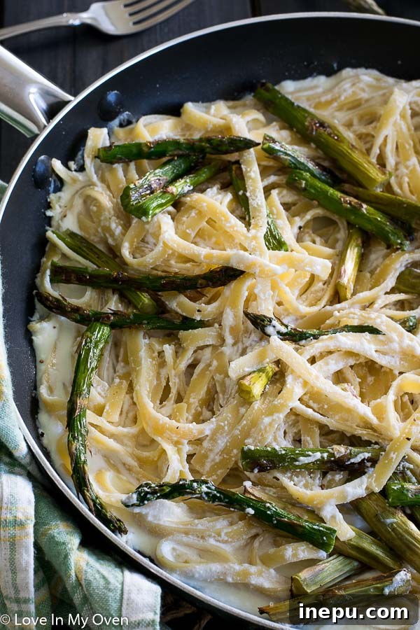 Golden Roasted Asparagus Pasta 3 Close-up of creamy roasted asparagus and ricotta fettuccine in a bowl