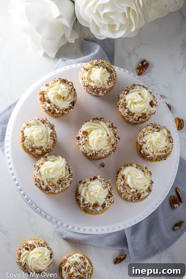 Perfectly Spiced Carrot Cupcakes 3 Close-up of Moist Carrot Cake Cupcakes with Cream Cheese Frosting