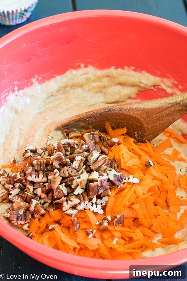 Perfectly Spiced Carrot Cupcakes 5 Perfectly Baked Carrot Cake Cupcakes Cooling on a Rack