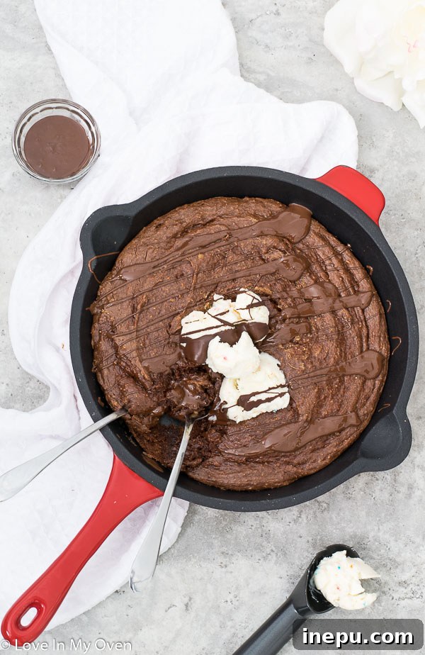 Decadent Gluten Free Brownies 3 Gooey gluten-free skillet brownies topped with ice cream and caramel sauce