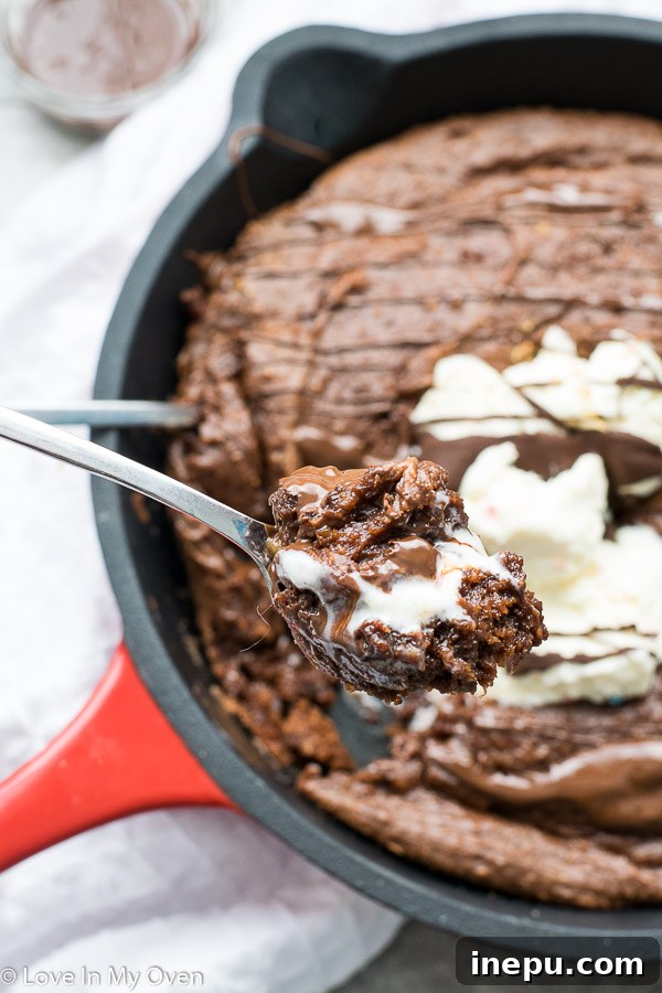 Decadent Gluten Free Brownies 7 Gluten-free skillet brownies garnished with fresh berries