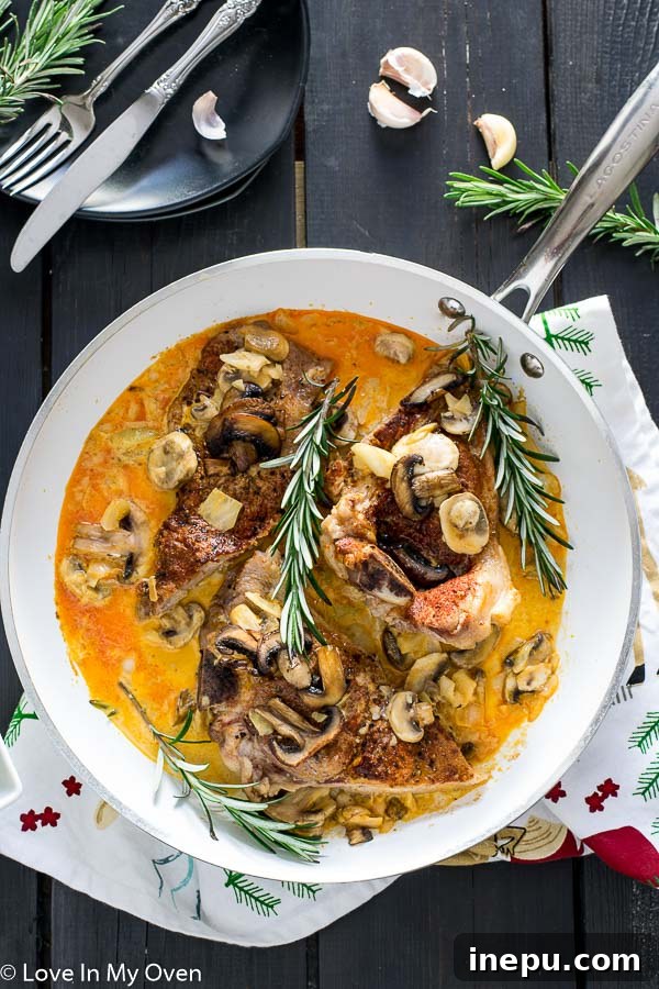 Golden Skillet Pork and Rice 2 One Pan Pork Chops and Rice - Seared pork chops with creamy mushroom sauce