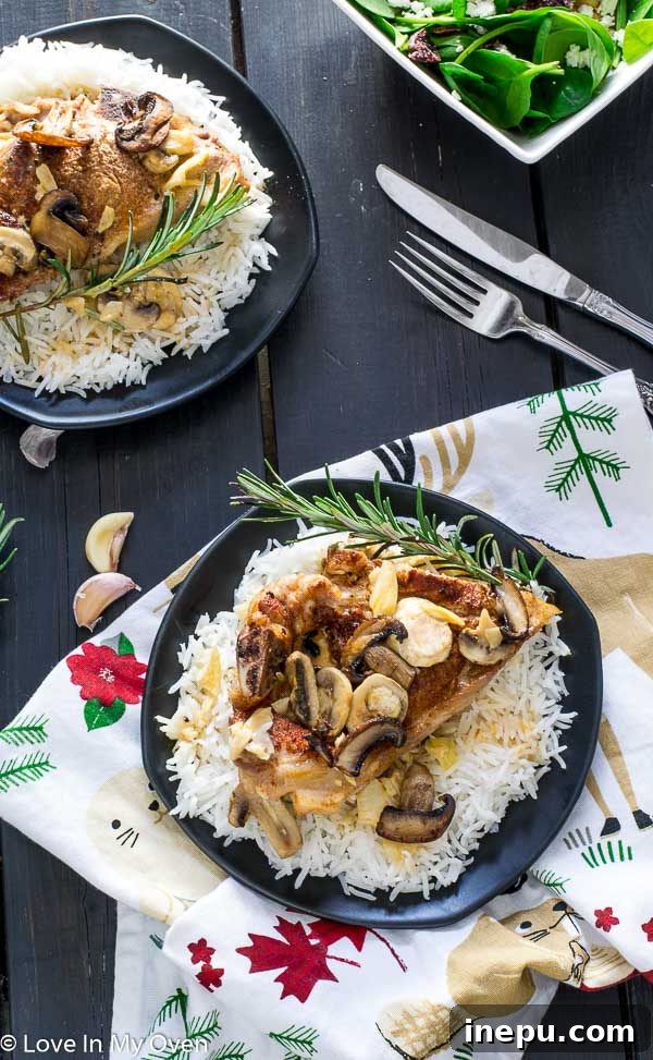 Golden Skillet Pork and Rice 6 One Pan Pork Chops and Mushrooms - Full spread of the dish
